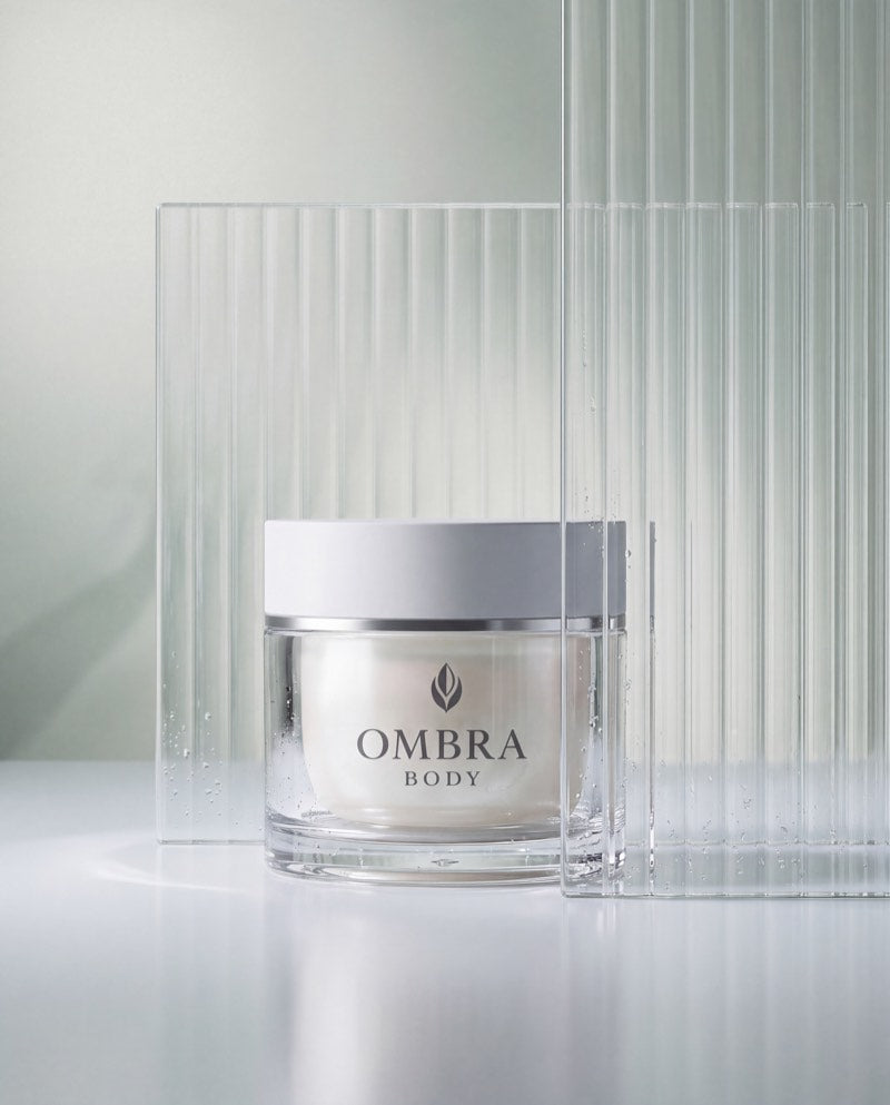 The OMBRA BODY jar among panels of fluted glass.